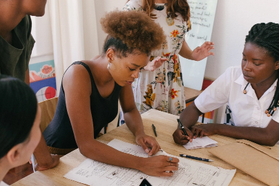 women working on desk
